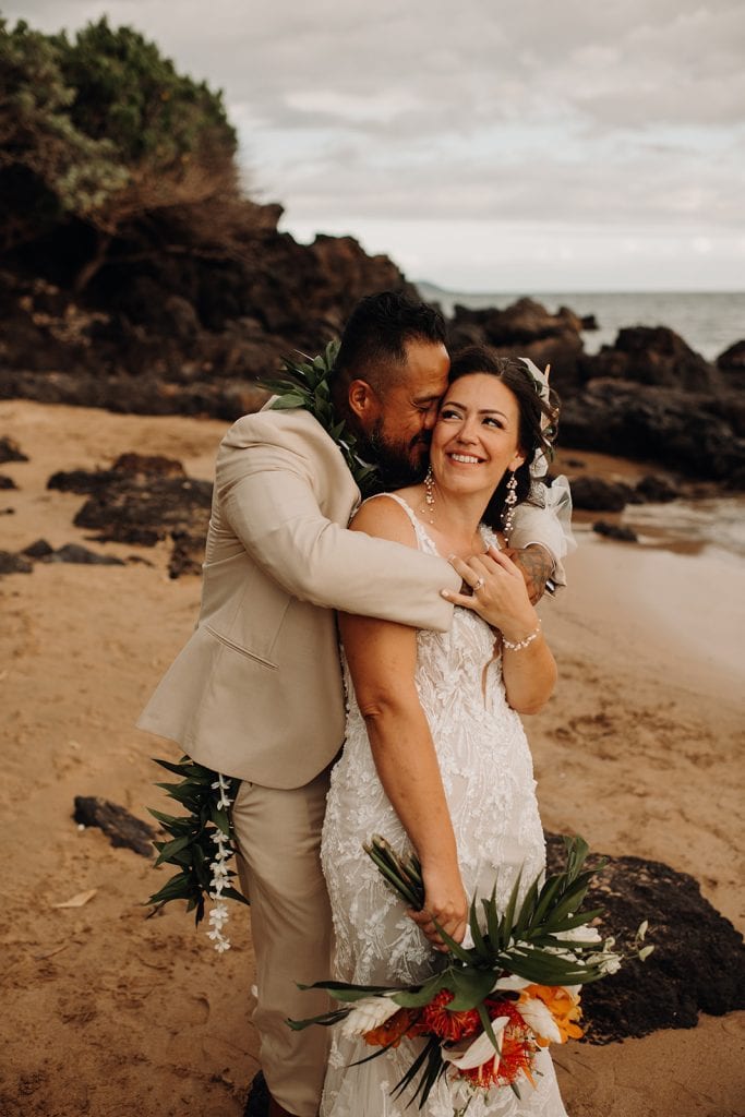 beautiful bride and groom photos with tropical floral arrangements