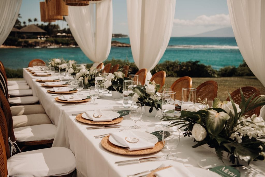 wedding in Lahaina with greenery and white wedding decor