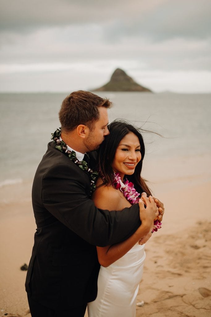 bride and groom on the beach in Hawaii