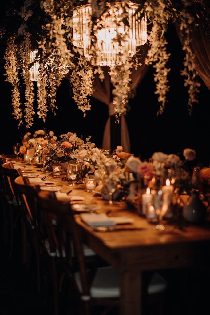 Elegant wedding reception decor, featuring tasteful details and a touch of tropical flair.