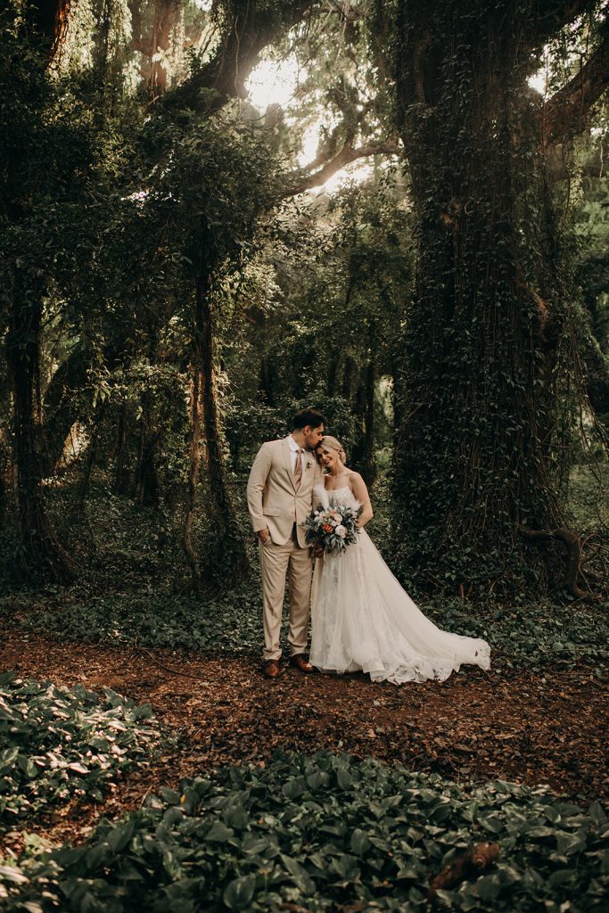 Bride and groom portraits in the jungle