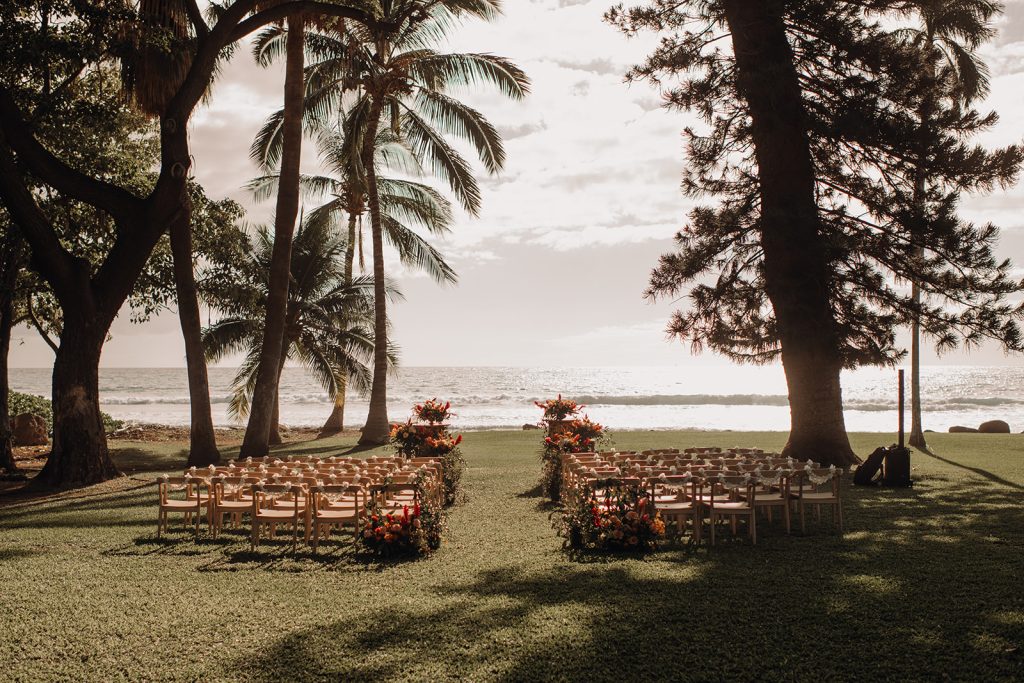 wedding ceremony setup against the ocean